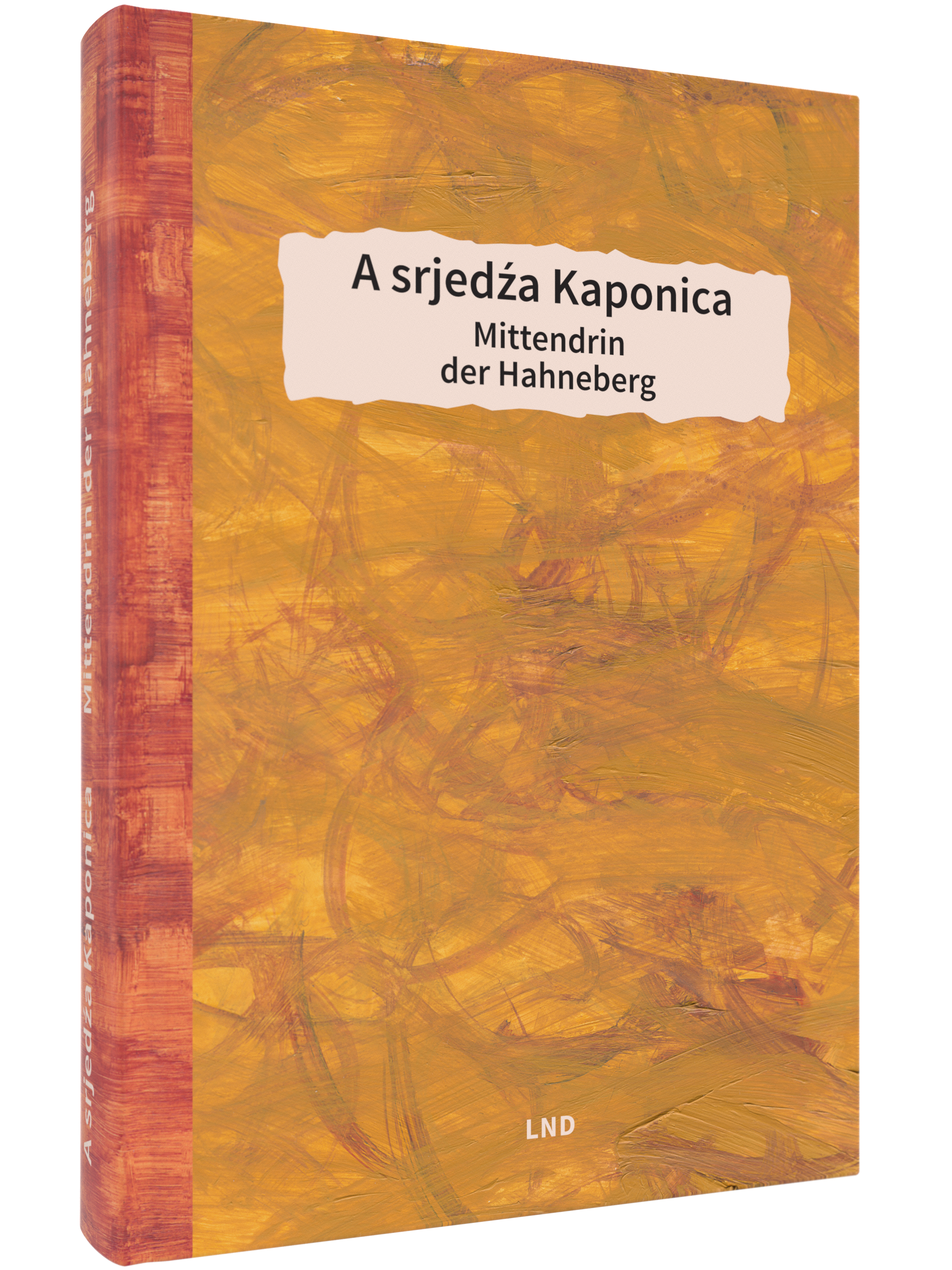 Buchcover von A srjedźa Kaponica Mittendrin der Hahneberg, erschienen im Domowina Verlag. Zusehen ist eine abstrakte Darstellung in Rot und Orange.